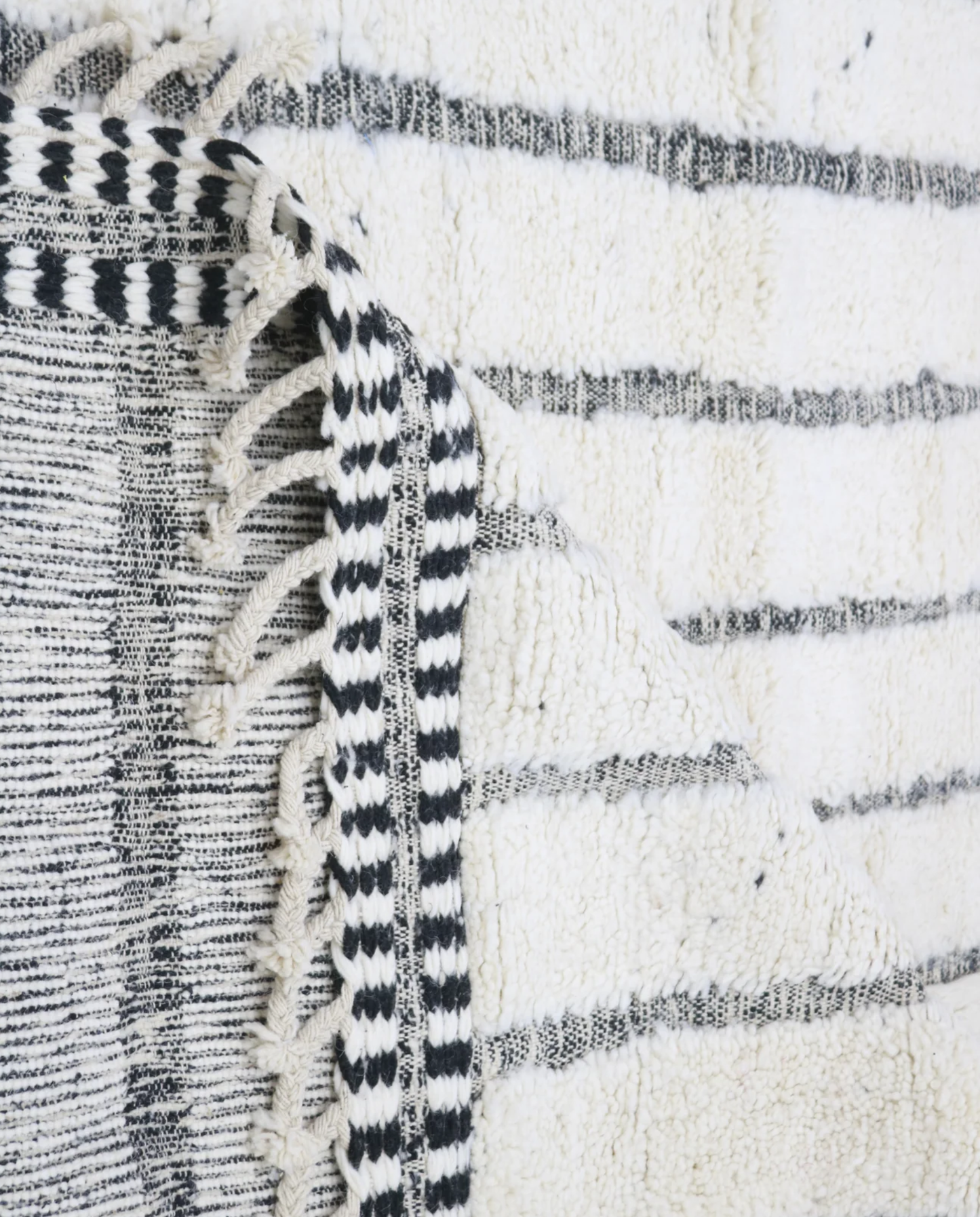 AFRA Beni Ourain cream organic abstract Moroccan rug back view showing traditional handwoven construction, by NURA