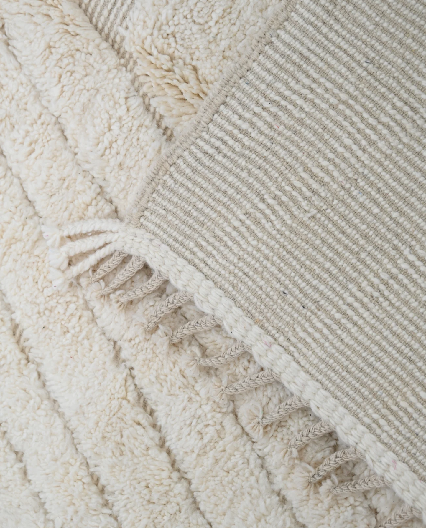 AFRAH Beni Ourain cream organic abstract Moroccan rug back view showing traditional handwoven construction, by NURA