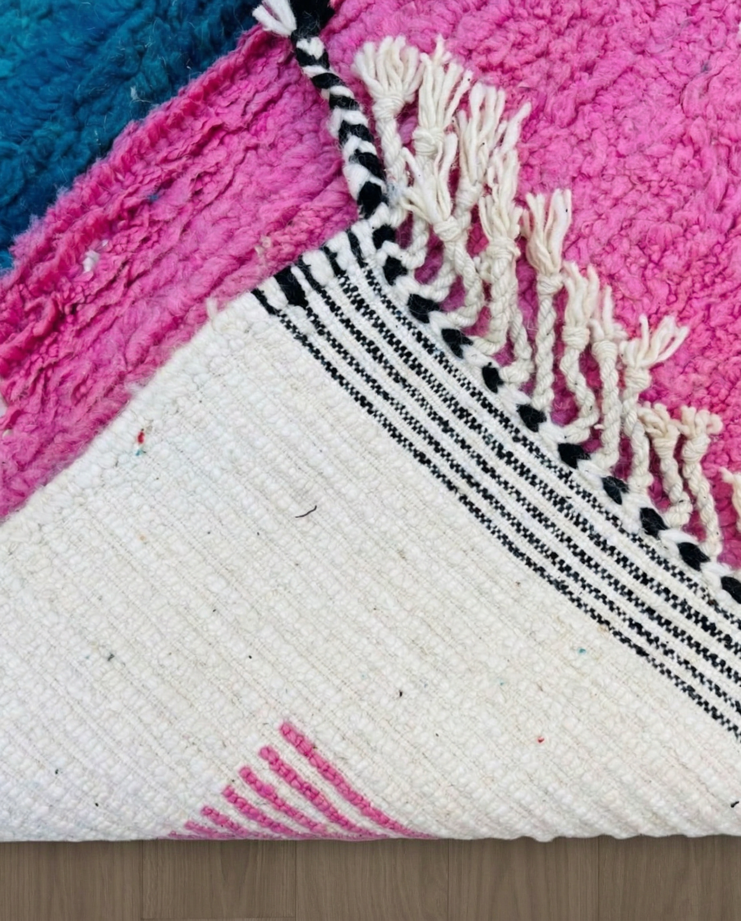 HAFSA Beni Ourain ivory abstract color block Moroccan rug back view showing traditional handwoven construction, by NURA