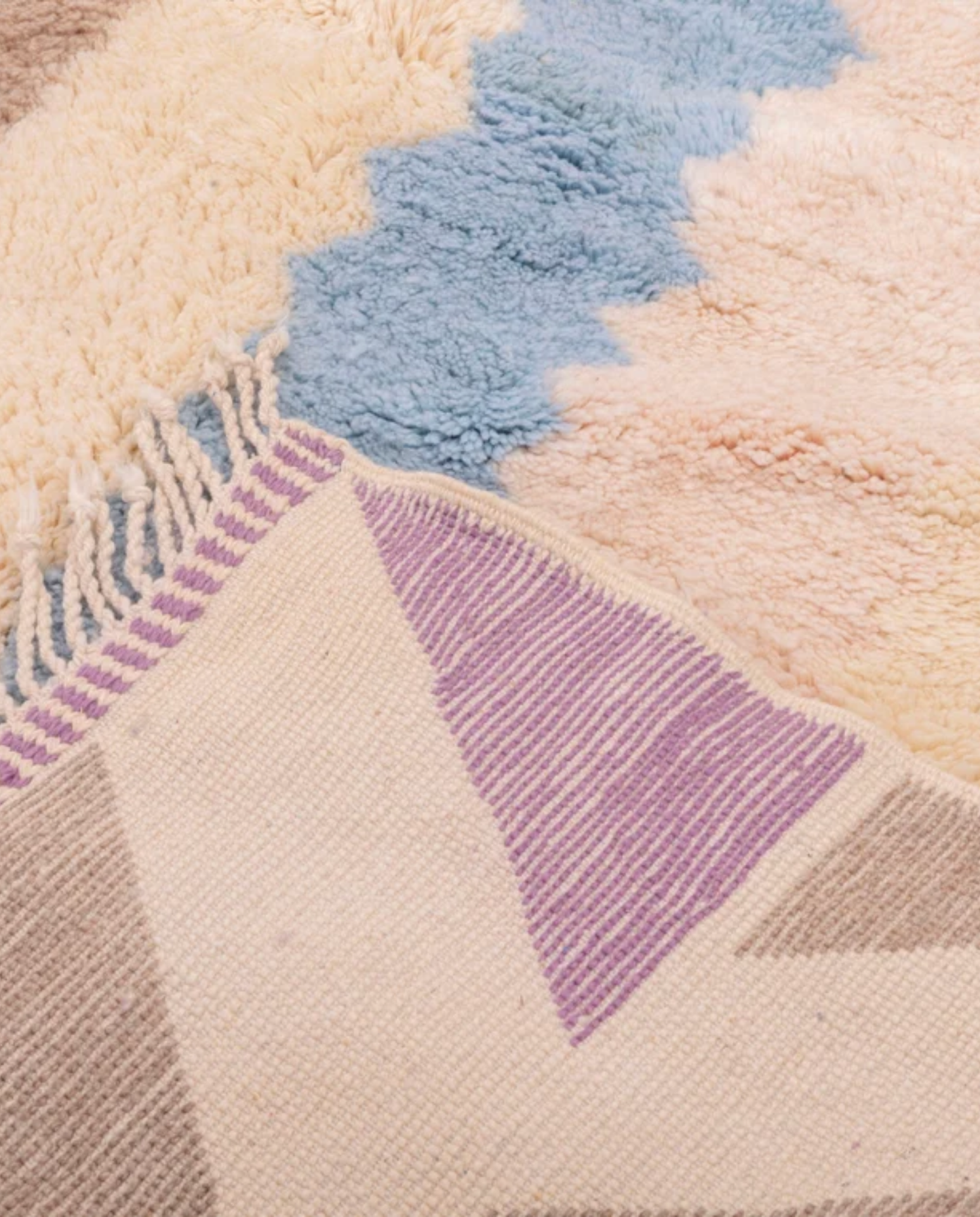 NAJAT Azilal cream zigzag vertical bands Moroccan rug back view showing traditional handwoven construction, by NURA