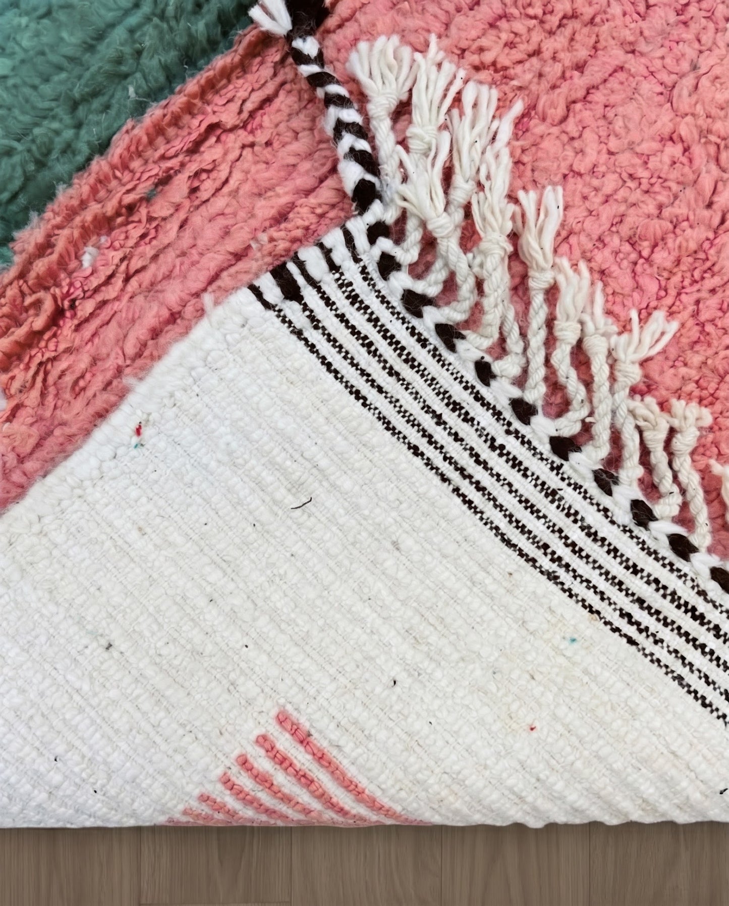 NARIMANE Azilal cream organic abstract Moroccan rug back view showing traditional handwoven construction, by NURA