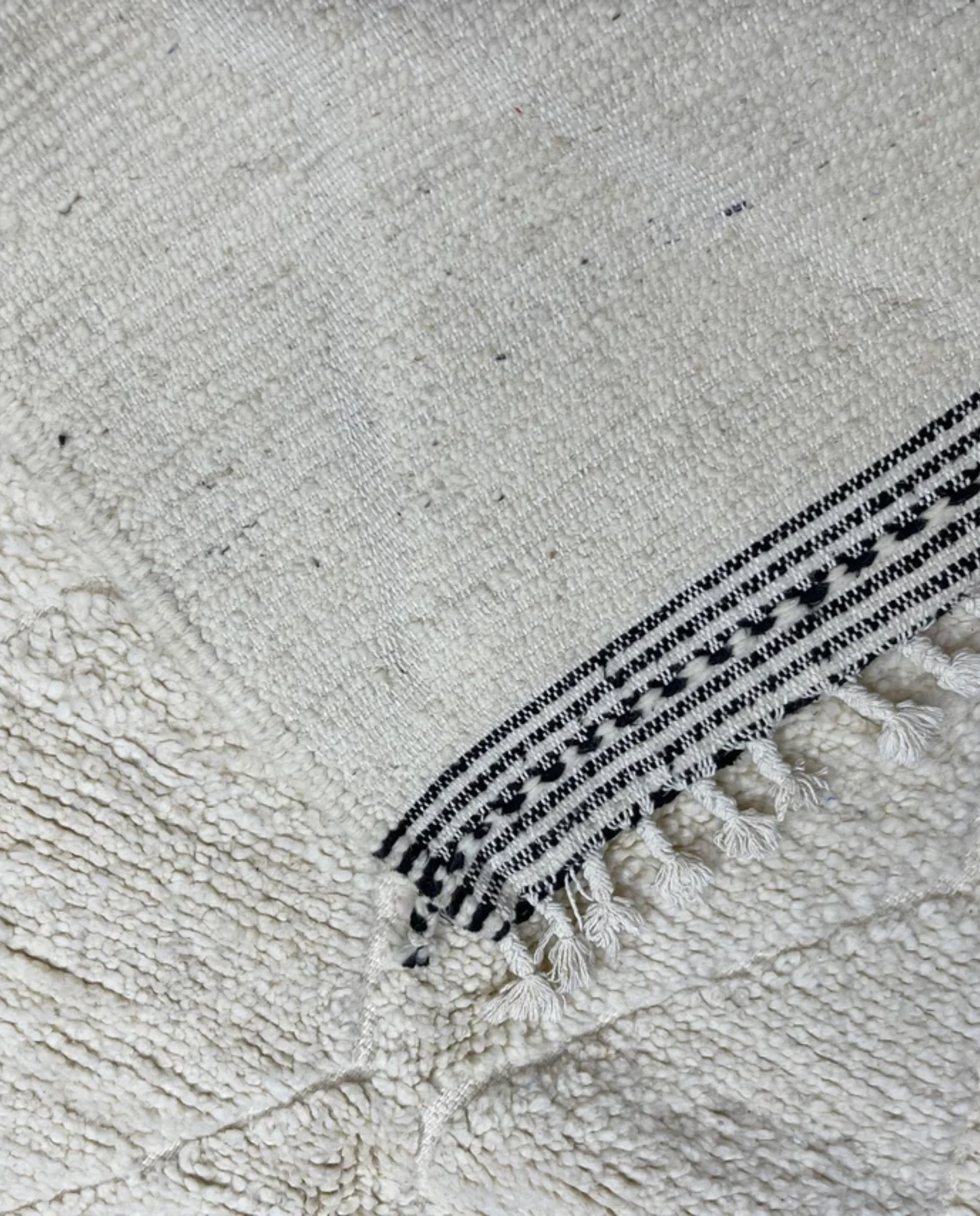 NASSIRA Beni Ourain cream diamond lattice Moroccan rug back view showing traditional handwoven construction, by NURA