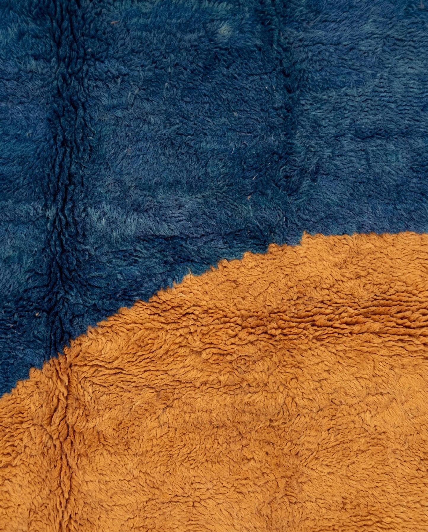 SAMIRA Beni Ourain cobalt bold color block Moroccan rug close-up showing hand-knotted wool texture and pile detail, by NURA