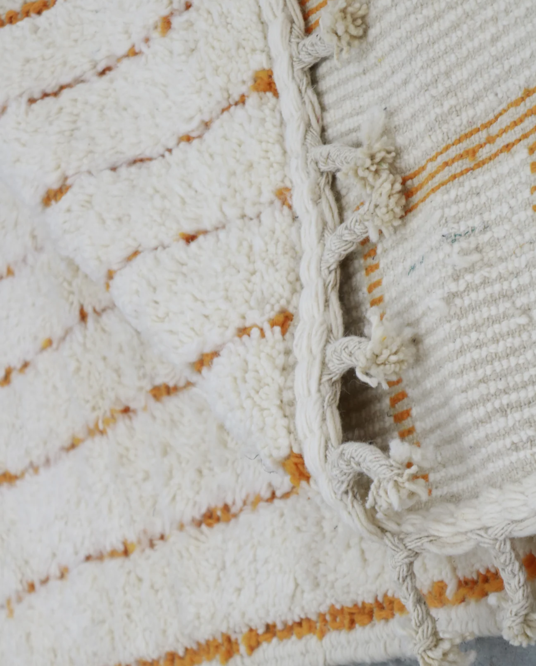 ADILA Beni Ourain cream organic abstract Moroccan rug back view showing traditional handwoven construction, by NURA