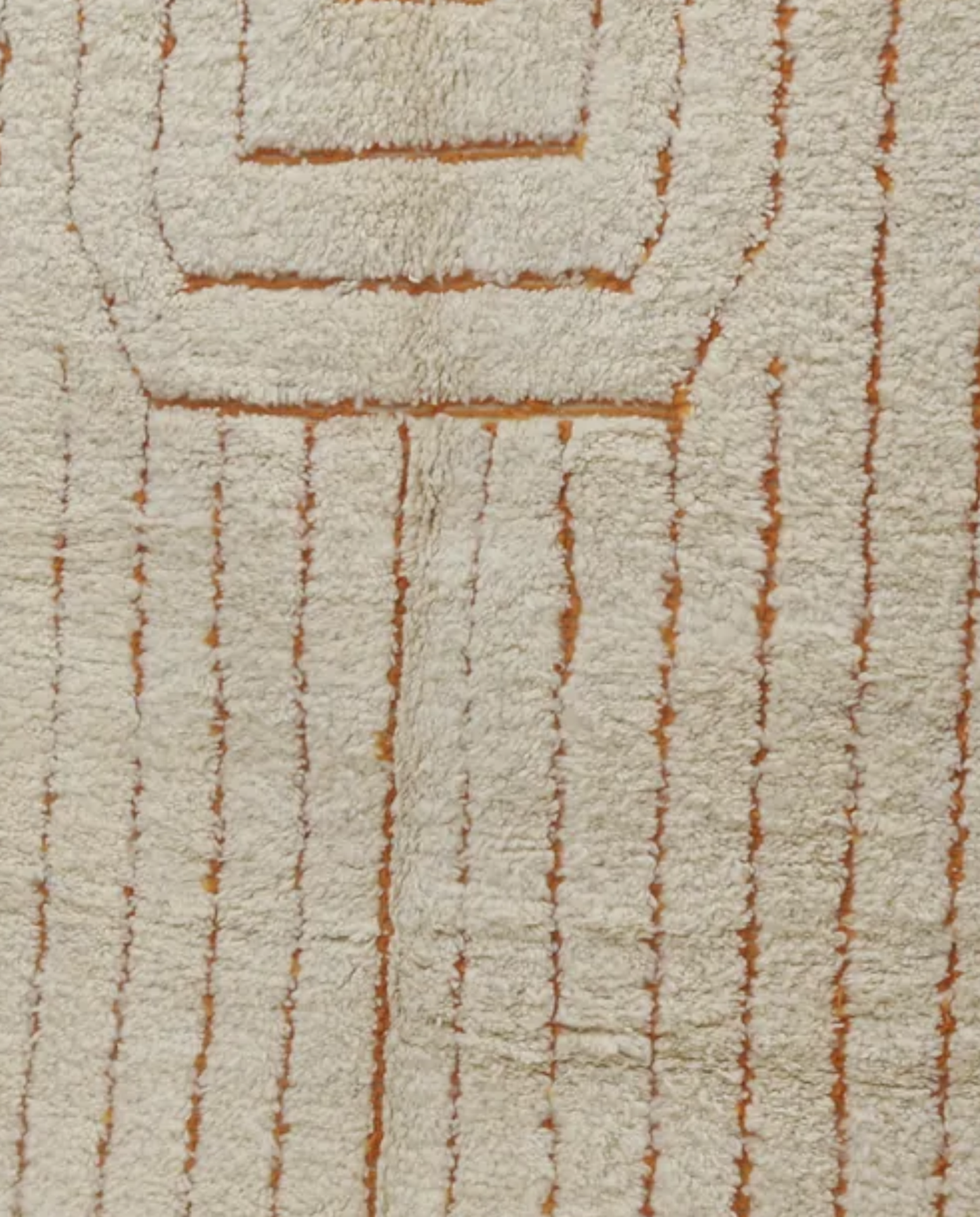 ADILA Beni Ourain cream organic abstract Moroccan rug close-up showing hand-knotted wool texture and pile detail, by NURA