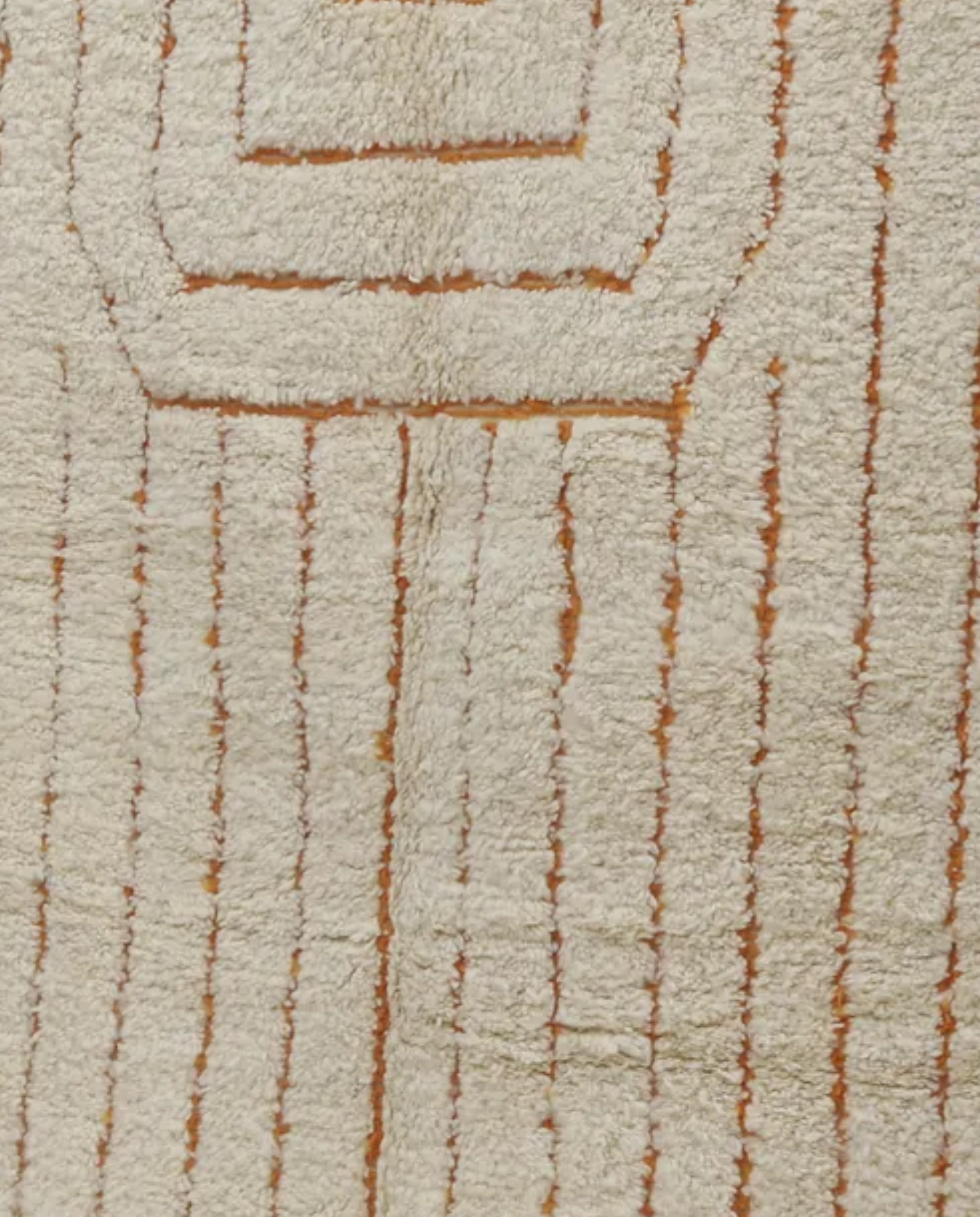 ADILA Beni Ourain cream organic abstract Moroccan rug close-up showing hand-knotted wool texture and pile detail, by NURA