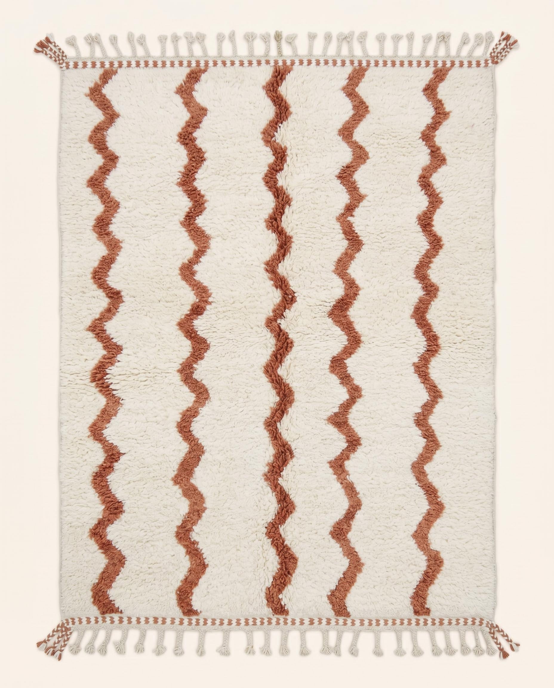 Hand-knotted Beni Ourain Moroccan rug featuring a plush cream wool pile with vertical wavy terracotta lines, by NURA.
