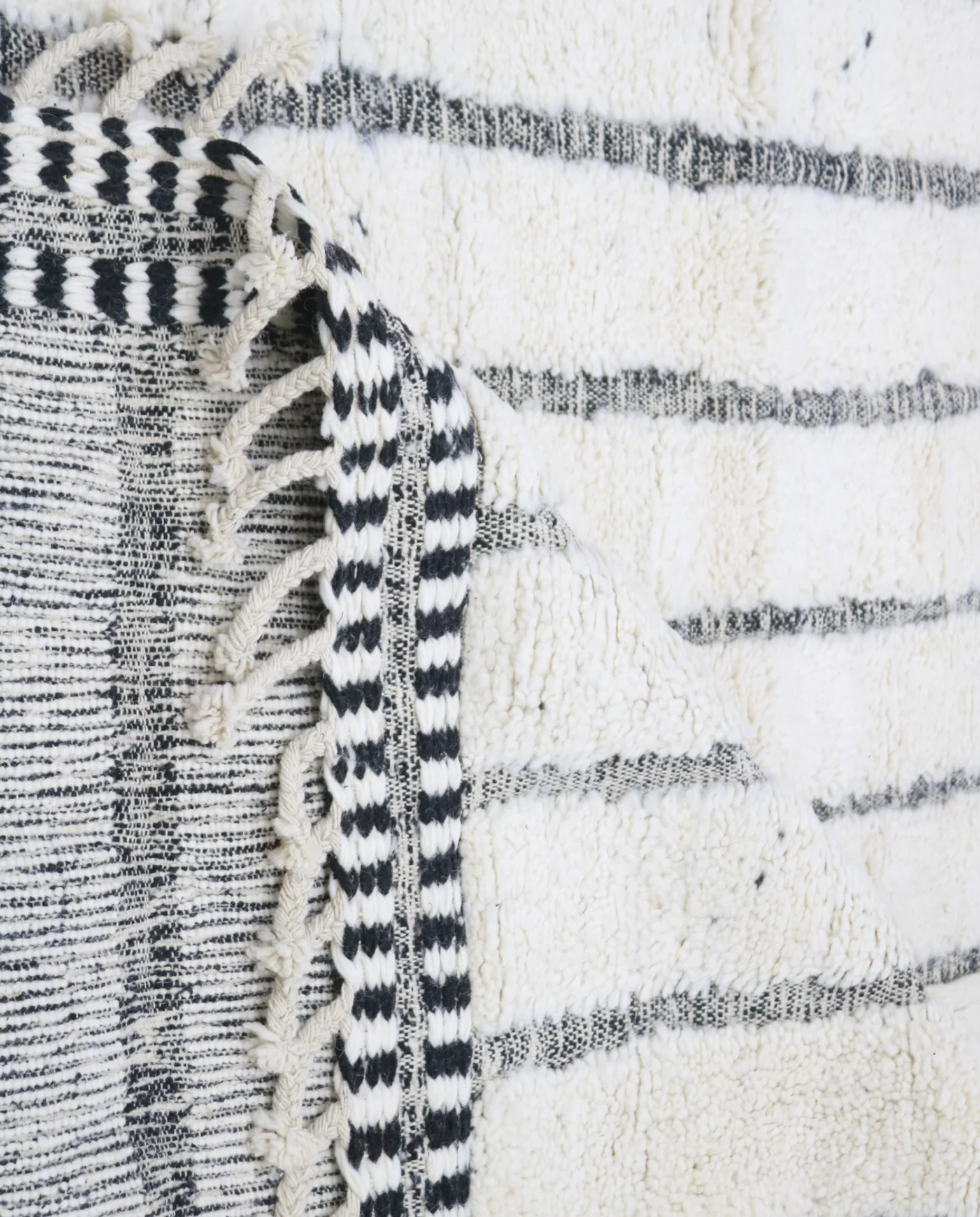 AFRA Beni Ourain cream organic abstract Moroccan rug back view showing traditional handwoven construction, by NURA