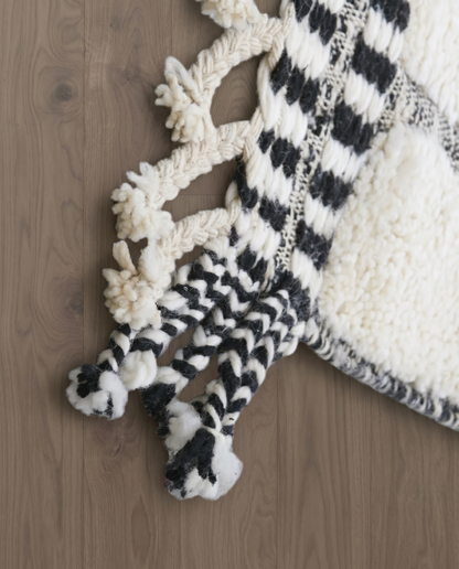 AFRA Beni Ourain cream organic abstract Moroccan rug close-up of hand-tied fringe and kilim band detail 2, by NURA