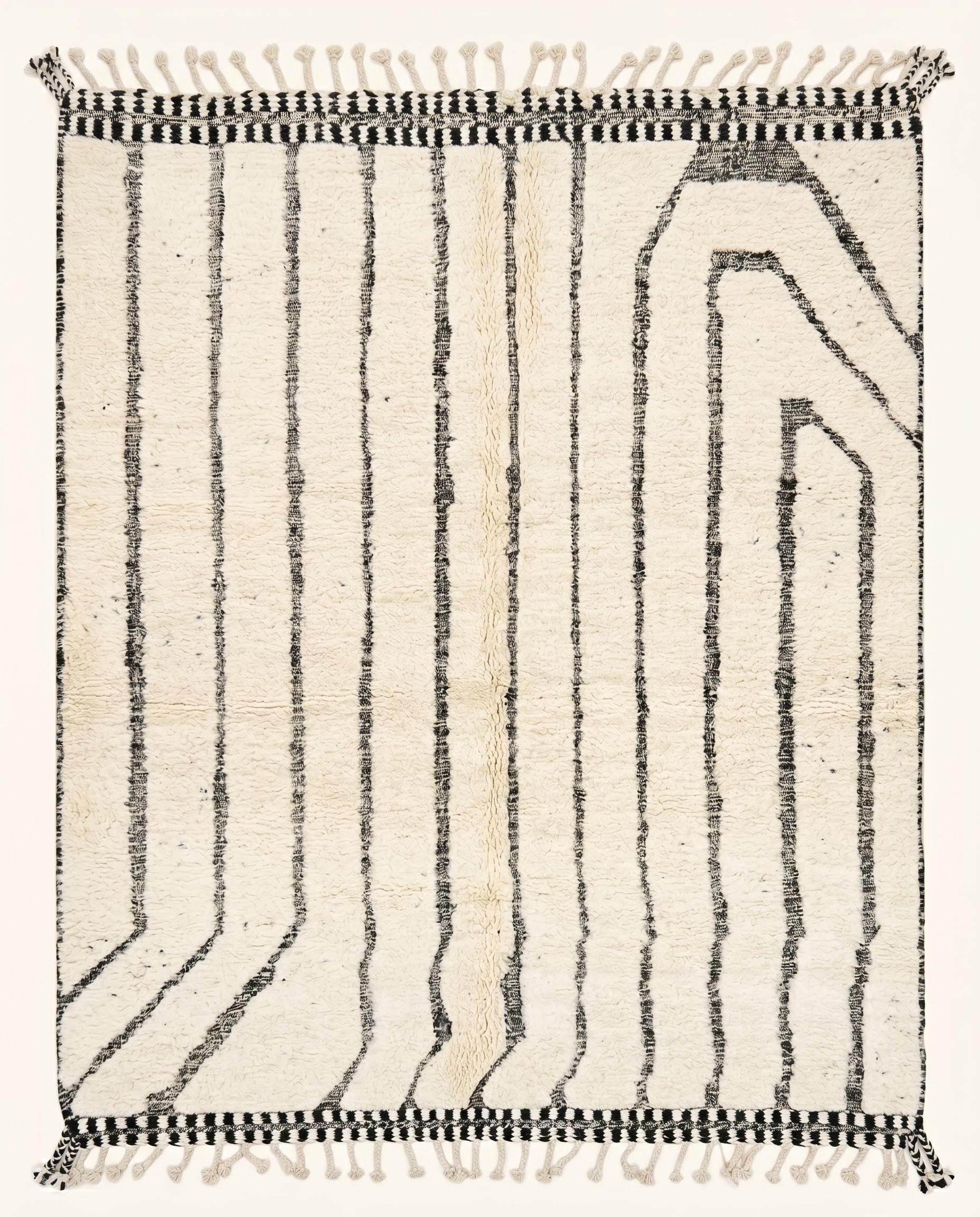 Plush cream Moroccan Beni Ourain rug featuring thin black vertical lines and an asymmetrical geometric arch by NURA.