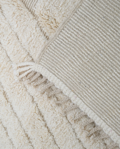 AFRAH Beni Ourain cream organic abstract Moroccan rug back view showing traditional handwoven construction, by NURA