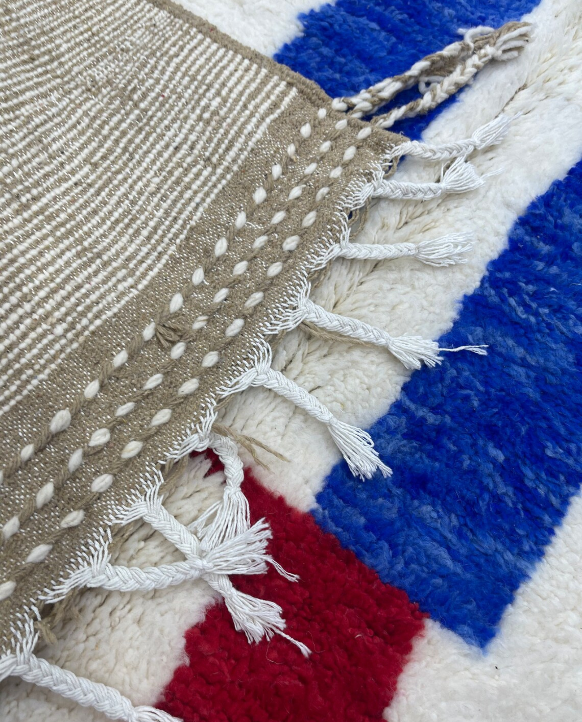 AICHA Beni Ourain ivory abstract color block Moroccan rug back view showing traditional handwoven construction, by NURA