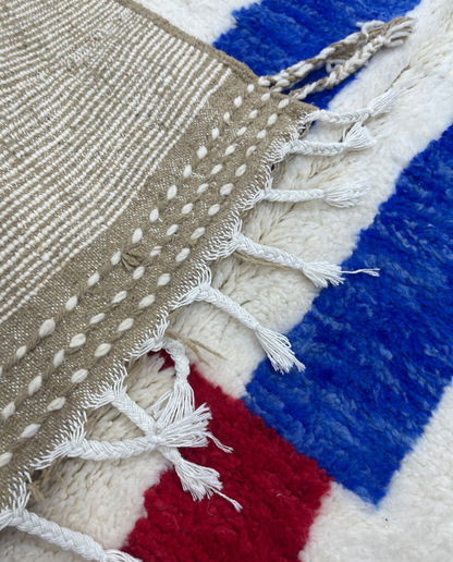 AICHA Beni Ourain ivory abstract color block Moroccan rug back view showing traditional handwoven construction, by NURA