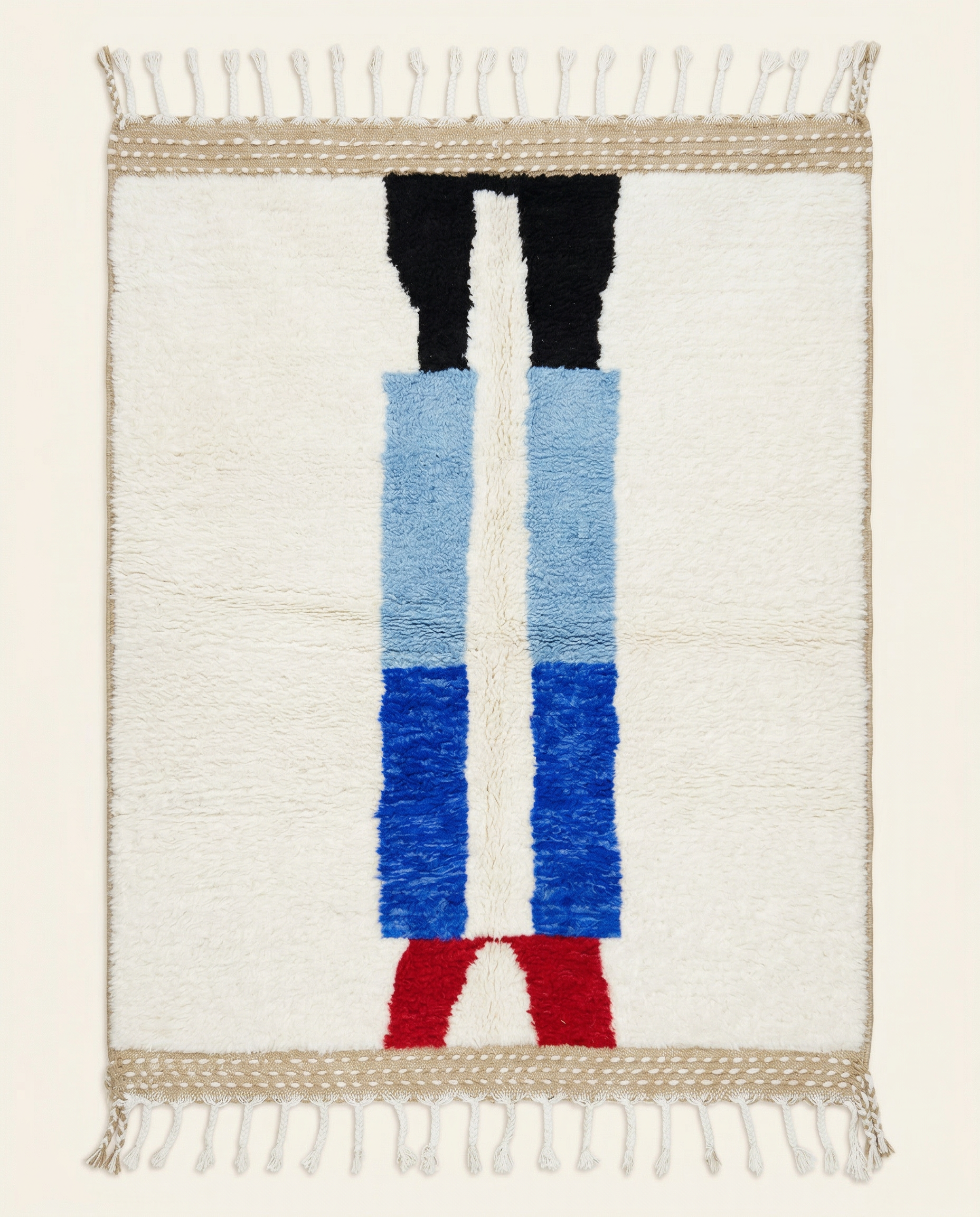 Plush ivory Beni Ourain Moroccan rug with a bold abstract color block design in cobalt blue, red, and black, by NURA.
