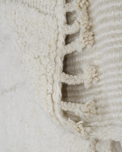 AKILA Beni Ourain cream organic abstract Moroccan rug back view showing traditional handwoven construction, by NURA