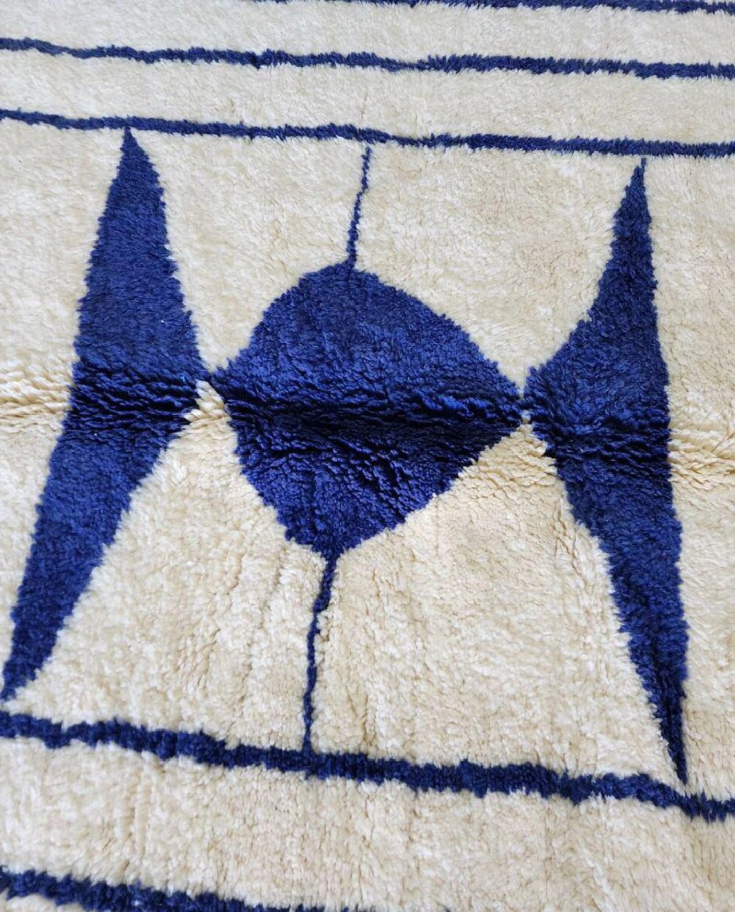AMINA Beni Ourain cream nested border medallion Moroccan rug close-up showing hand-knotted wool texture and pile detail 1, by NURA