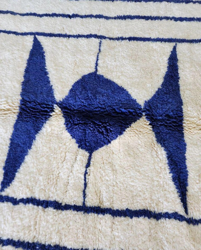 AMINA Beni Ourain cream nested border medallion Moroccan rug close-up showing hand-knotted wool texture and pile detail 1, by NURA