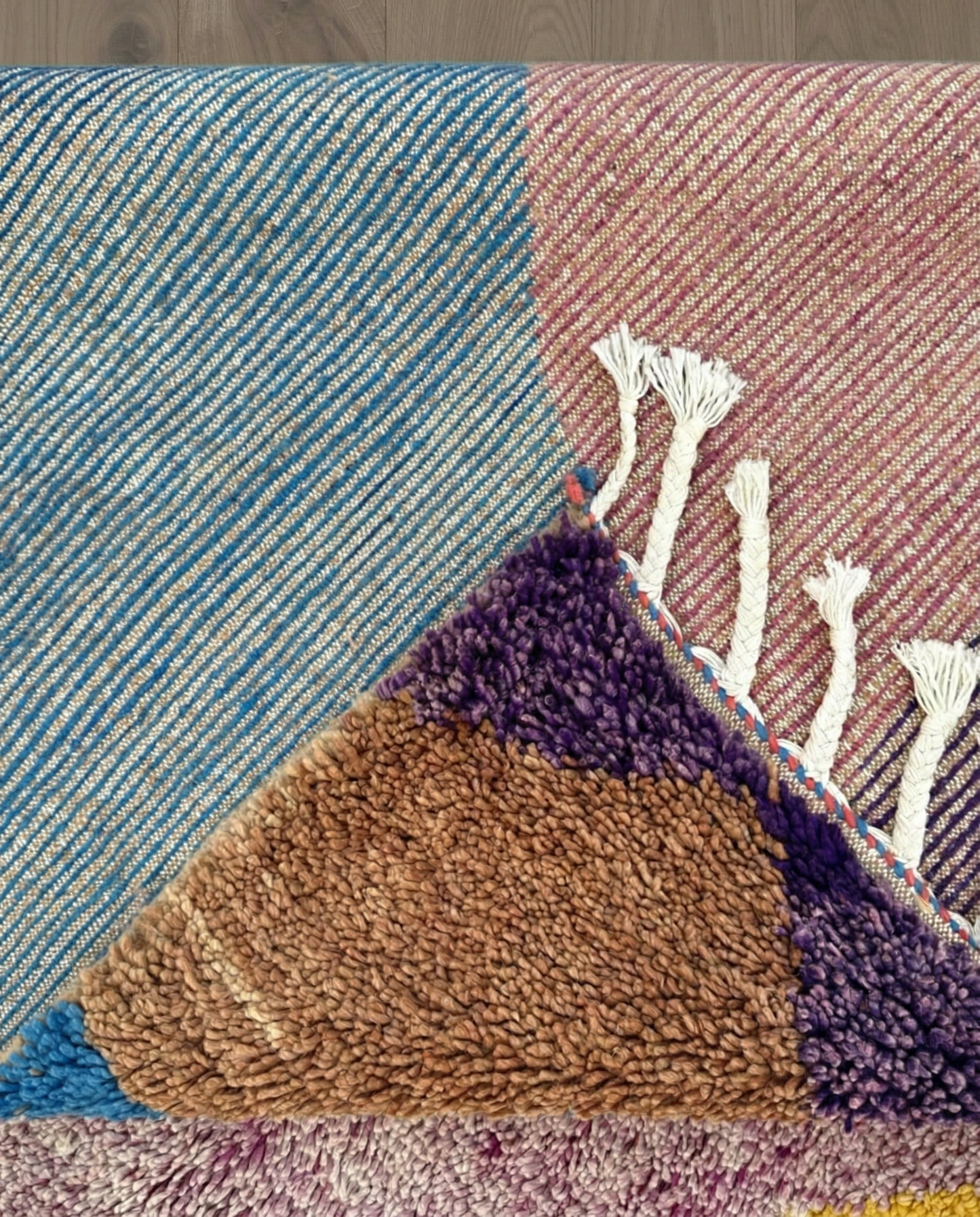 AMNA Azilal cobalt abstract color block Moroccan rug back view showing traditional handwoven construction, by NURA
