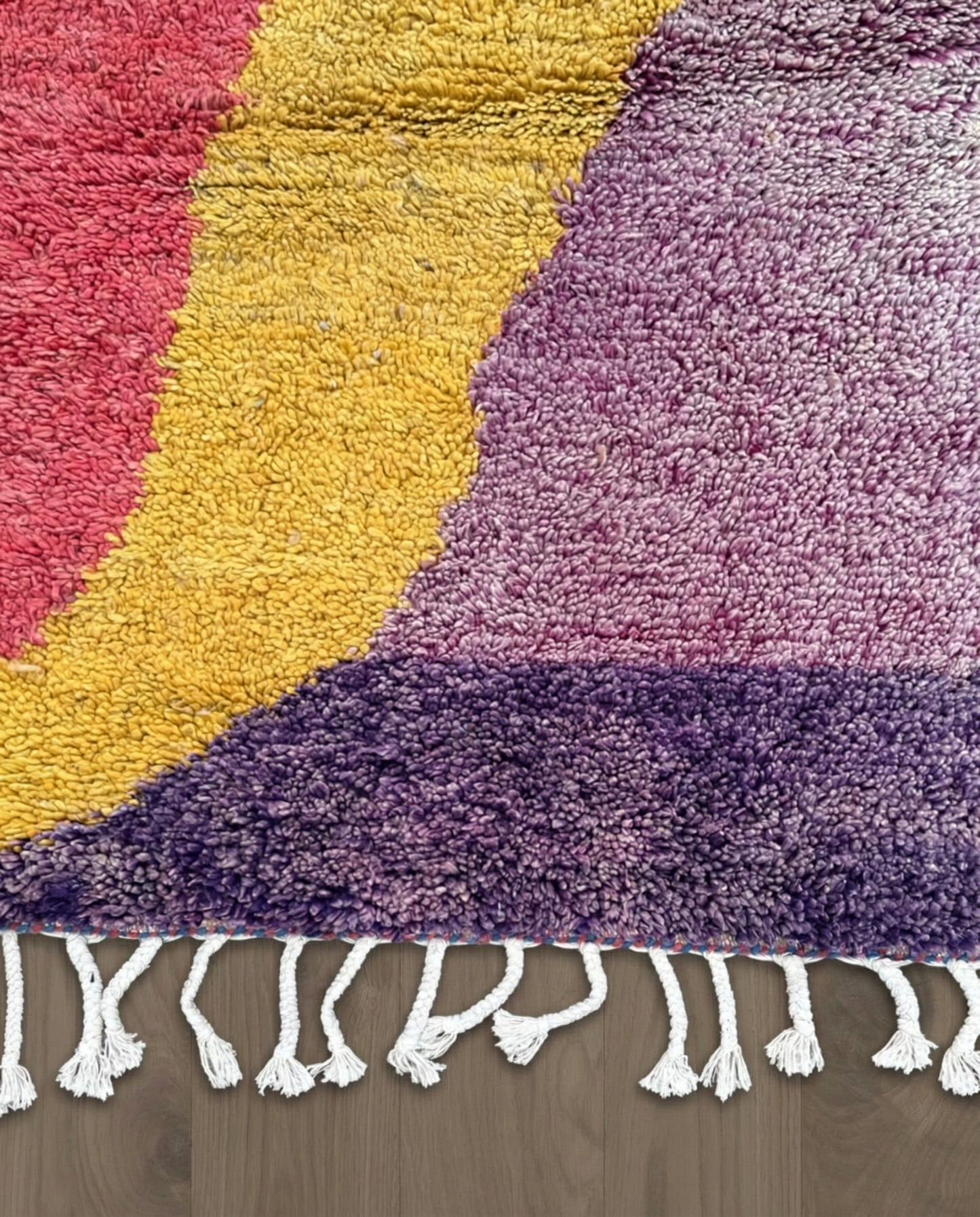 AMNA Azilal cobalt abstract color block Moroccan rug close-up of hand-tied fringe and kilim band detail, by NURA