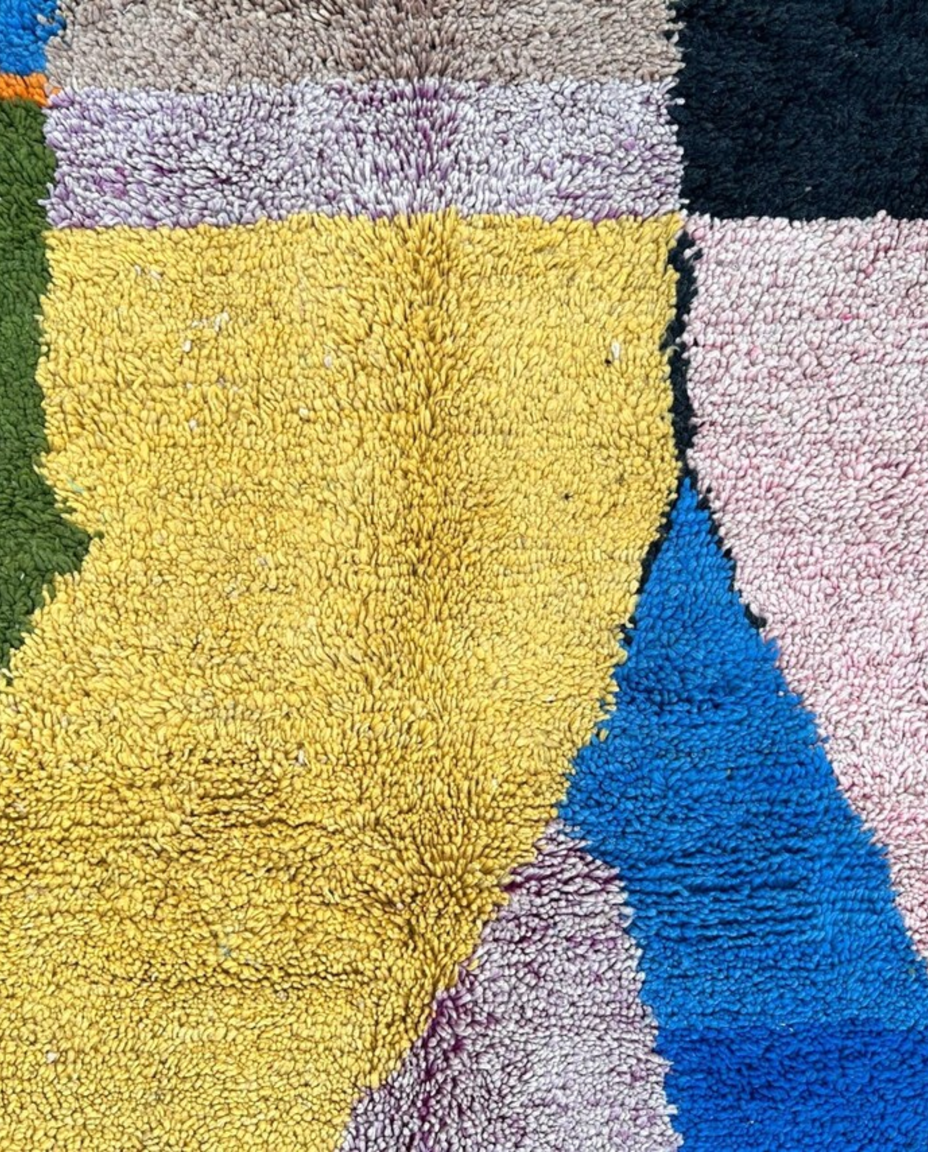 AMNA Azilal cobalt abstract color block Moroccan rug close-up showing hand-knotted wool texture and pile detail 1, by NURA