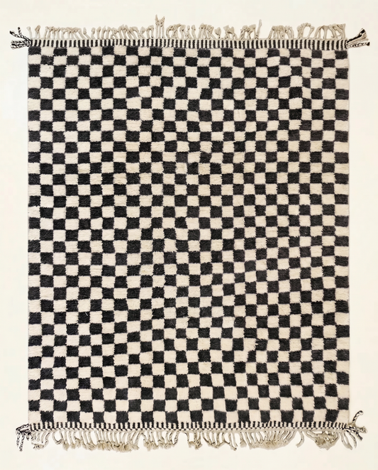 Plush black and cream Beni Ourain Moroccan rug with a bold checkerboard grid and high pile, by NURA.