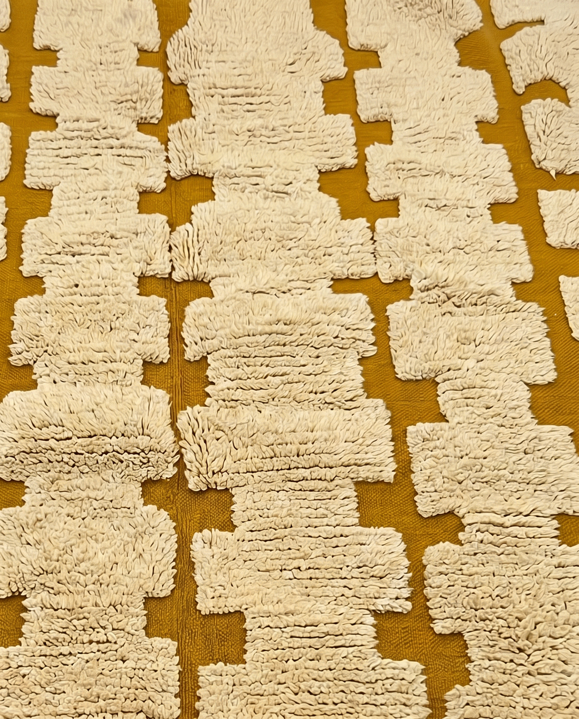 ARWA Beni Ourain mustard stepped columns Moroccan rug close-up showing hand-knotted wool texture and pile detail, by NURA