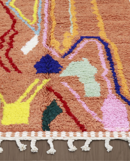 ASALA Boujad terracotta organic abstract Moroccan rug close-up of hand-tied fringe and kilim band detail 2, by NURA