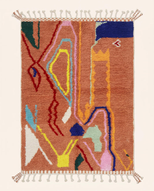 Vibrant Boujad Moroccan rug featuring an organic abstract design with colorful painterly lines on a terracotta wool pile by NURA.