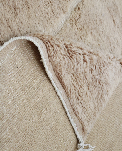 ASSIA Mrirt camel solid carved field Moroccan rug back view showing traditional handwoven construction 1, by NURA