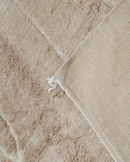 ASSIA Mrirt camel solid carved field Moroccan rug back view showing traditional handwoven construction 2, by NURA