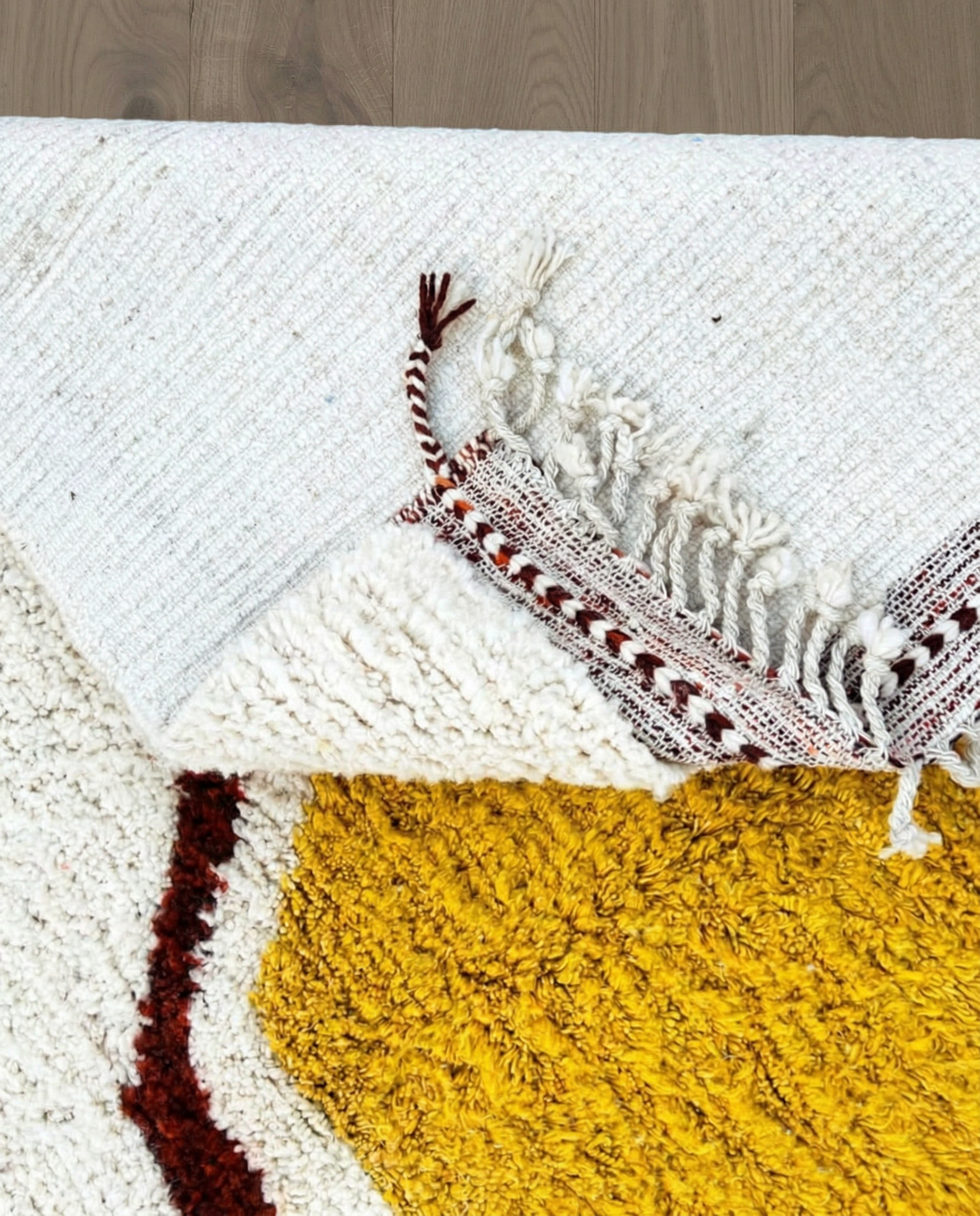BASMA Beni Ourain cream stacked abstract motifs Moroccan rug back view showing traditional handwoven construction, by NURA