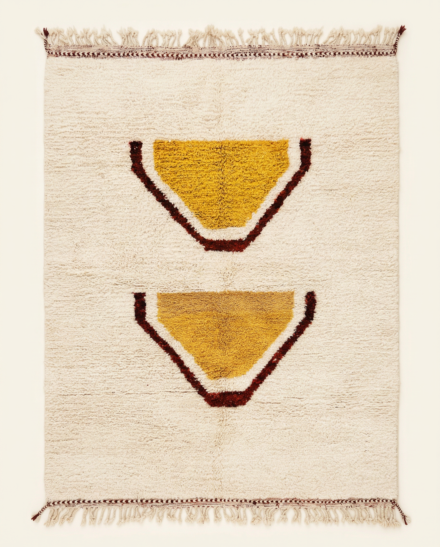 Plush cream Beni Ourain Moroccan rug with large stacked abstract motifs in mustard yellow and rust, by NURA.