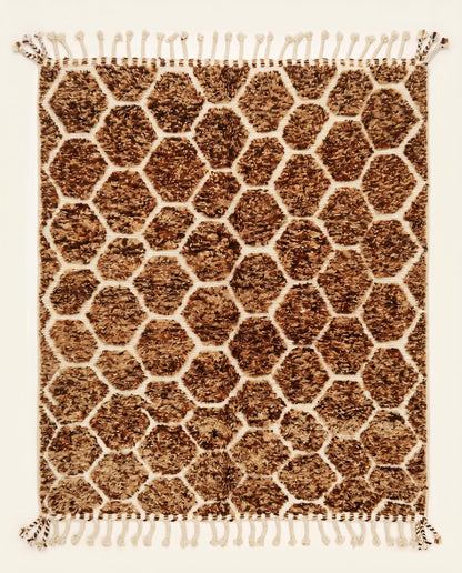Plush brown and cream Azilal Moroccan rug featuring a raised geometric honeycomb lattice pattern, handcrafted by NURA.