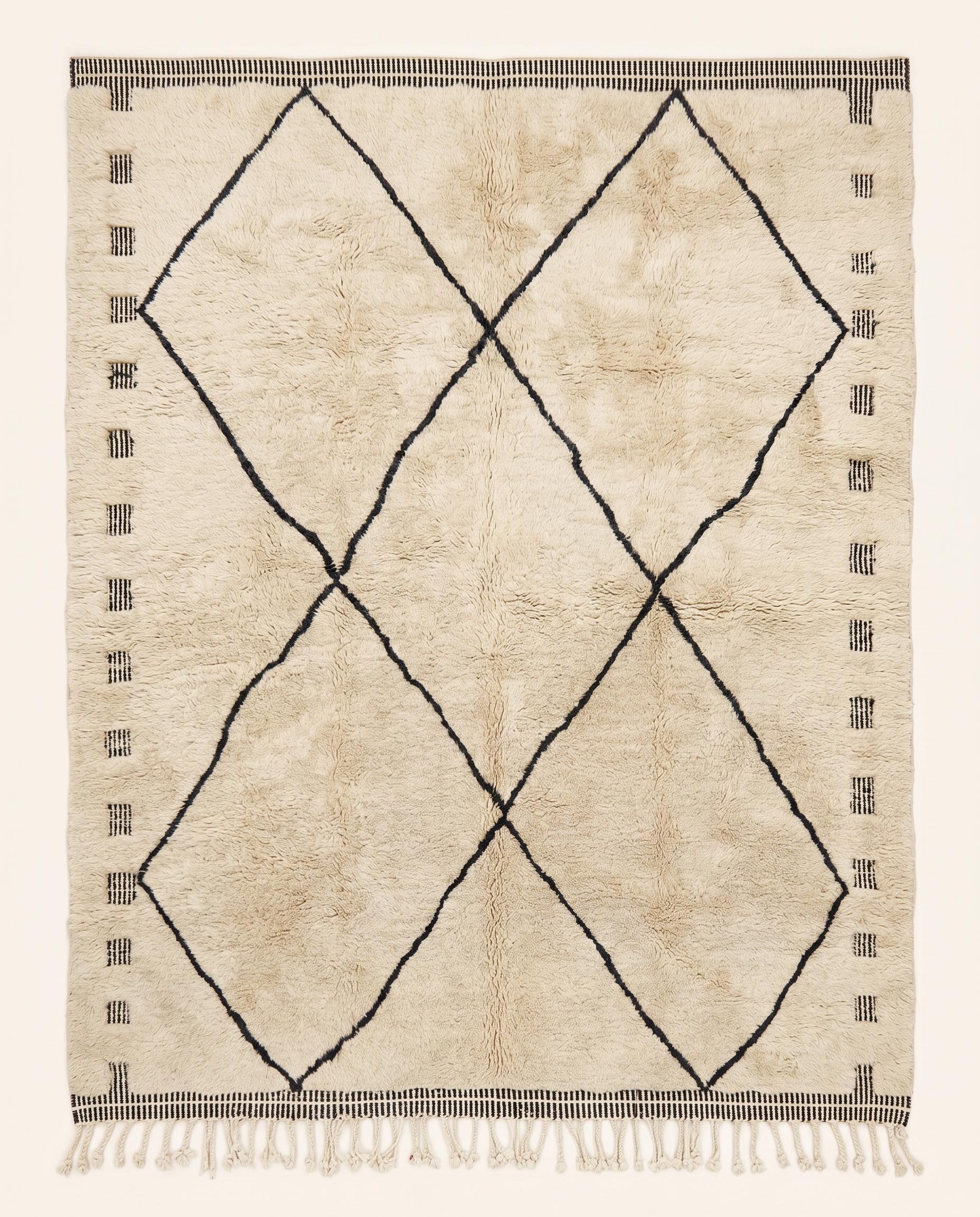 A plush cream Mrirt Moroccan rug featuring a minimalist black diamond lattice pattern, hand-knotted in wool by NURA.