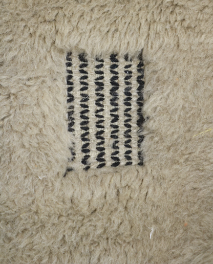 BINA Mrirt cream diamond lattice Moroccan rug close-up showing hand-knotted wool texture and pile detail 2, by NURA
