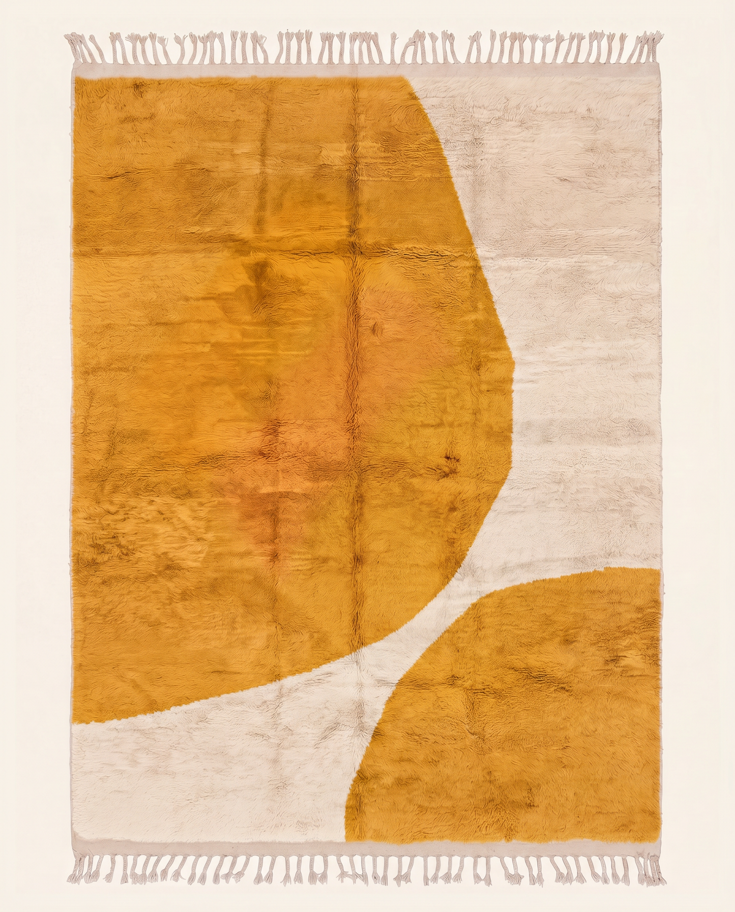 Plush Moroccan wool rug featuring bold mustard and cream organic abstract shapes, hand-knotted for a modern space by NURA.