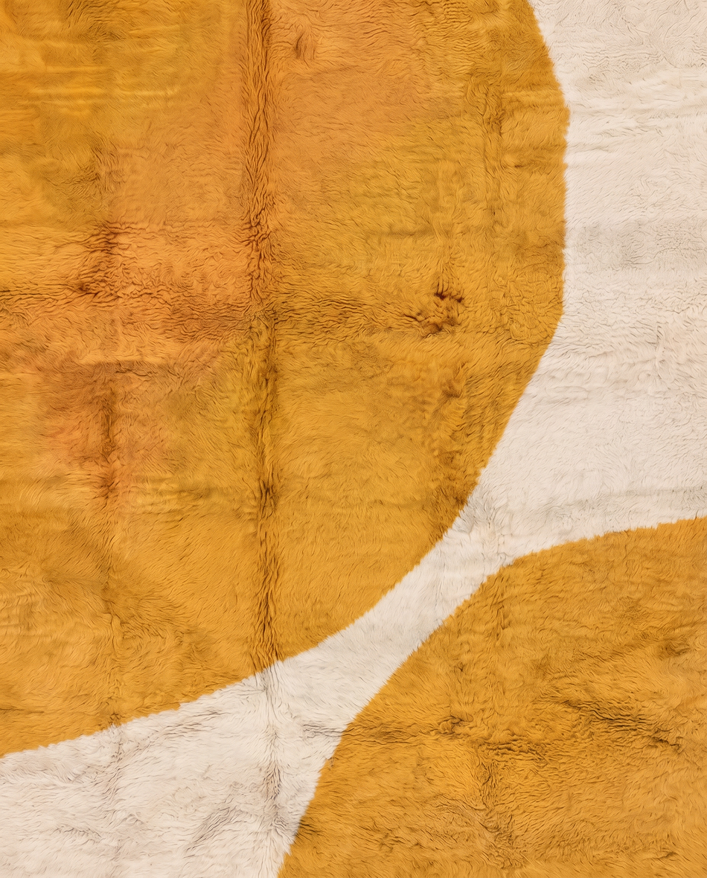 BISAN Beni Ourain mustard organic abstract Moroccan rug close-up showing hand-knotted wool texture and pile detail, by NURA
