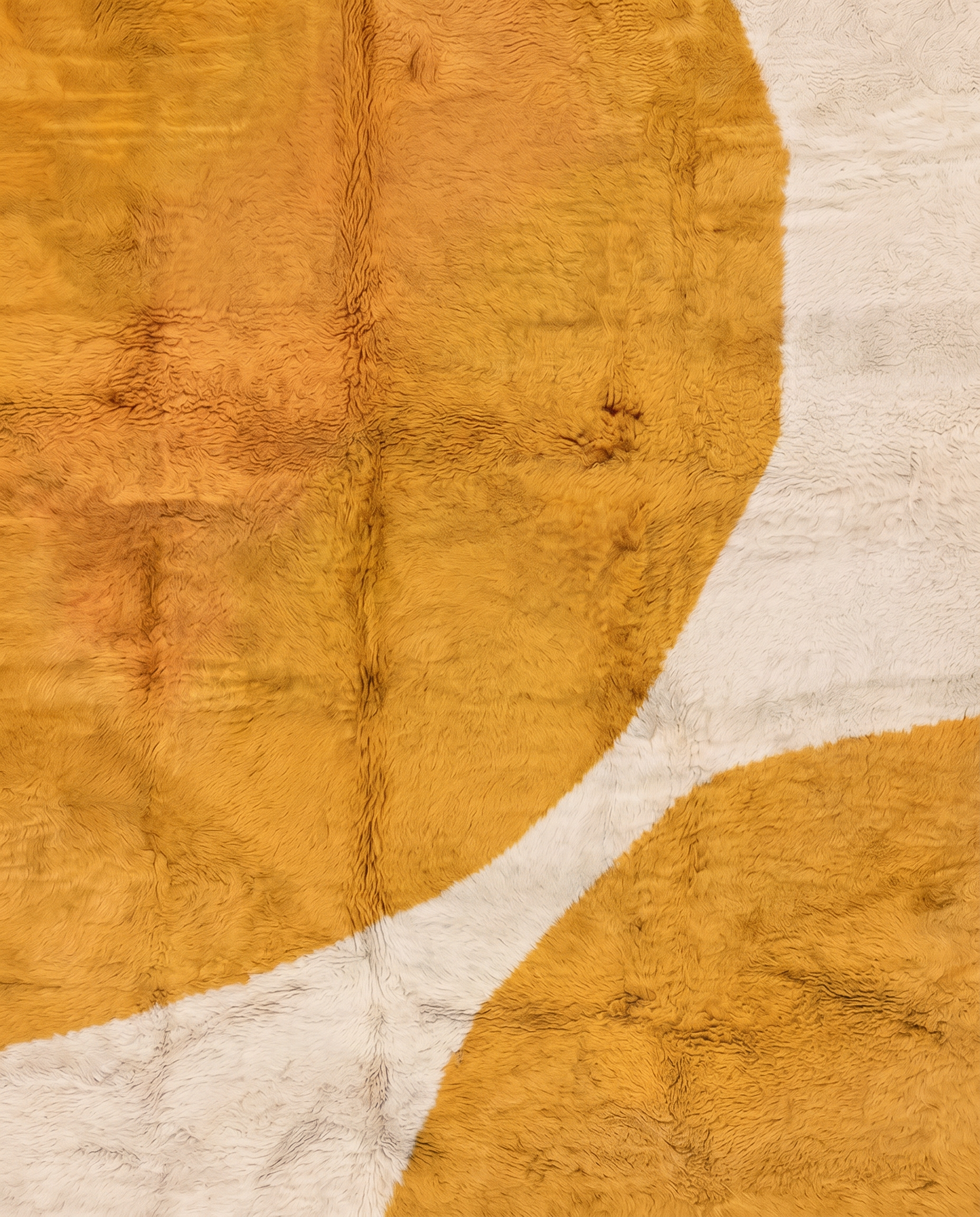 BISAN Beni Ourain mustard organic abstract Moroccan rug close-up showing hand-knotted wool texture and pile detail, by NURA
