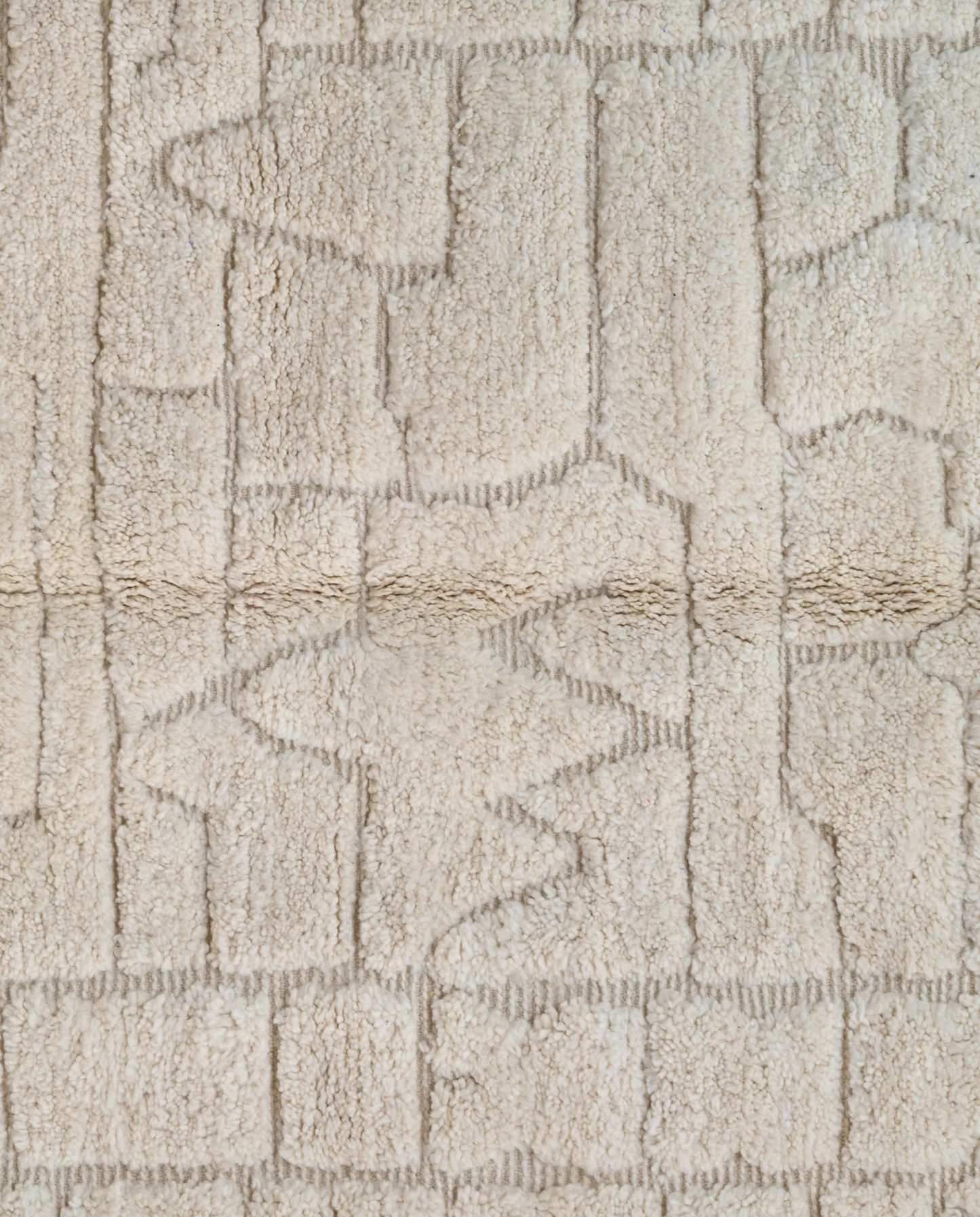 BOUTHAINA Beni Ourain cream organic abstract Moroccan rug close-up showing hand-knotted wool texture and pile detail 1, by NURA