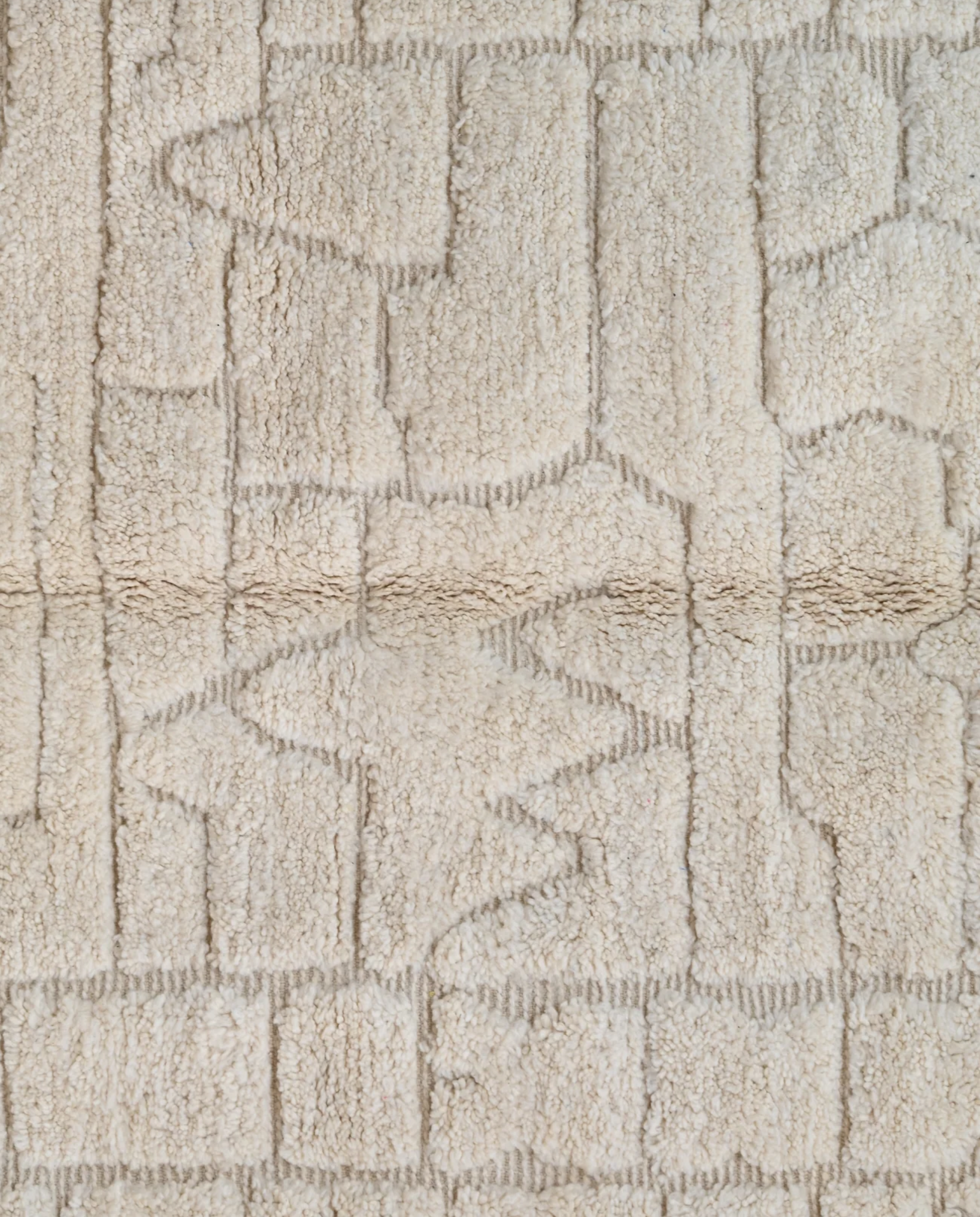 BOUTHAINA Beni Ourain cream organic abstract Moroccan rug close-up showing hand-knotted wool texture and pile detail 1, by NURA