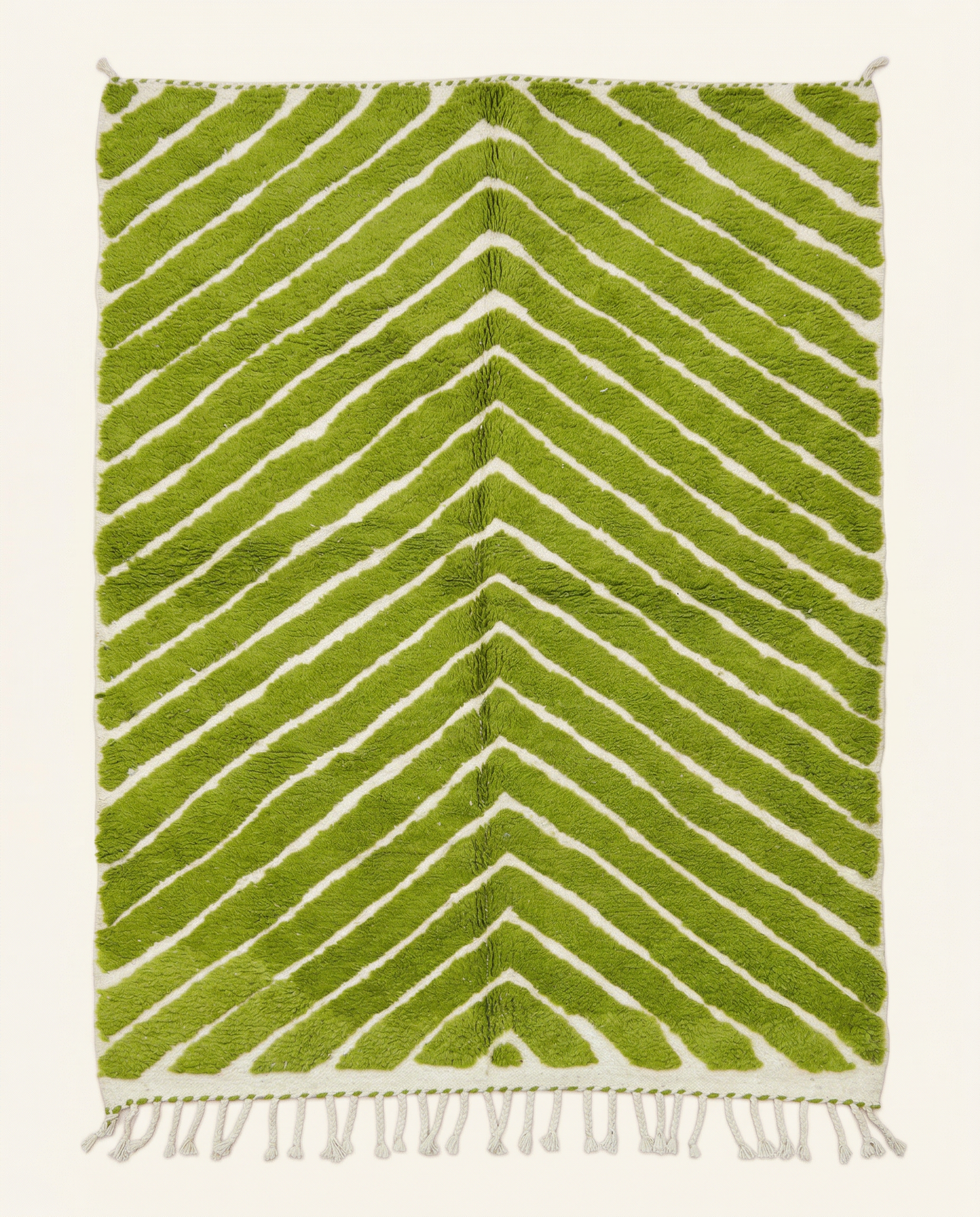 Plush ivory and vibrant green Beni Ourain Moroccan rug with bold chevron stripes and a high-low texture, by NURA.
