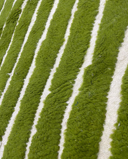 LAMIA Beni Ourain green chevron stripes Moroccan rug close-up showing hand-knotted wool texture and pile detail 2, by NURA