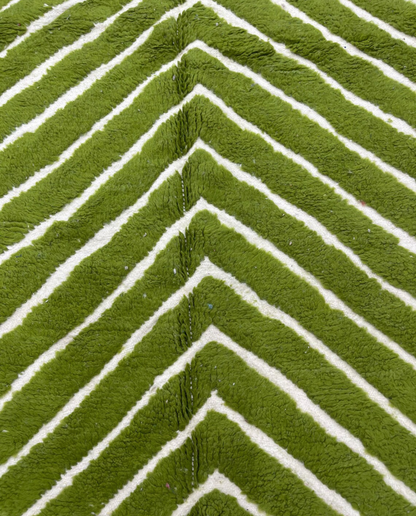 LAMIA Beni Ourain green chevron stripes Moroccan rug close-up showing hand-knotted wool texture and pile detail, by NURA