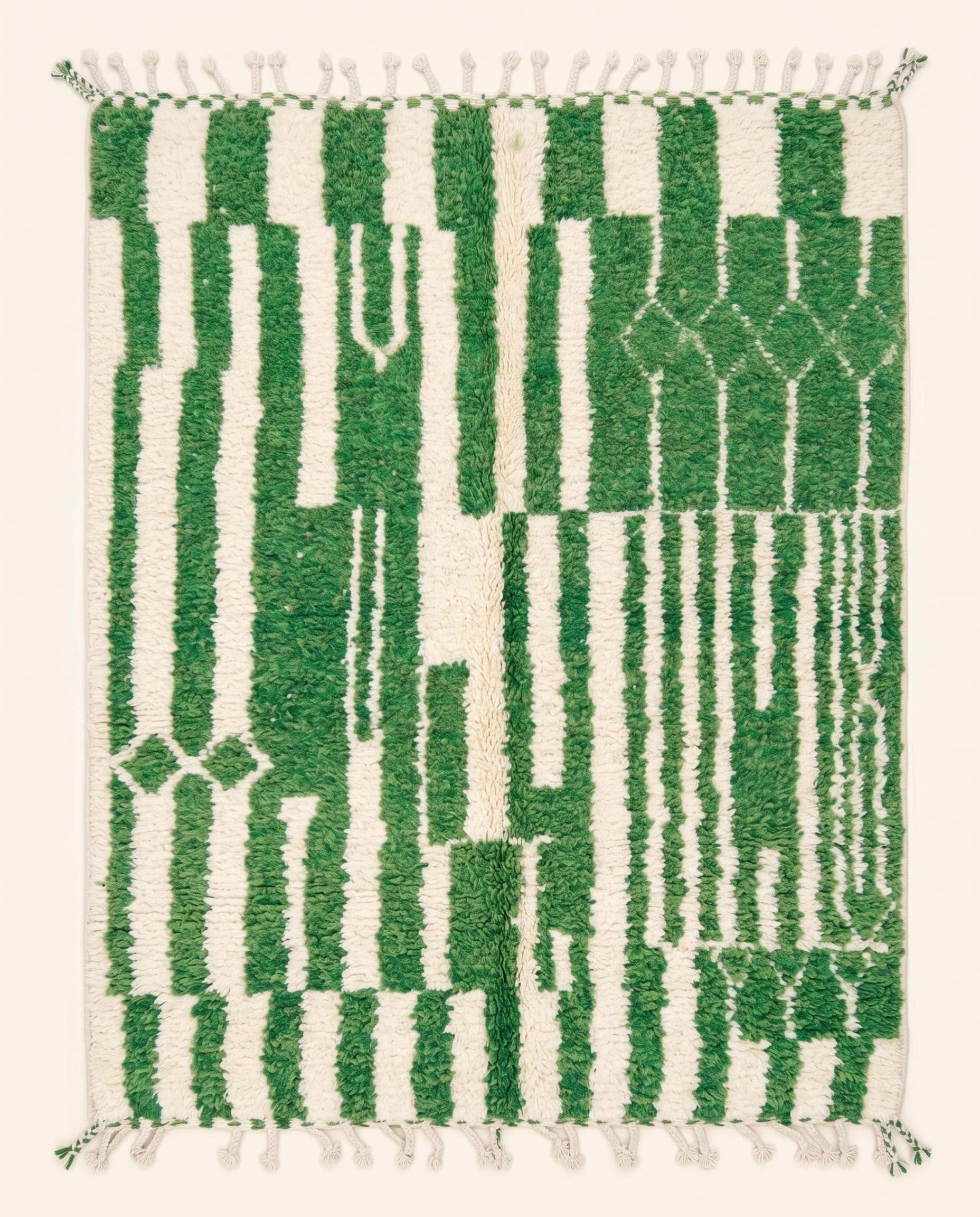 A vibrant Azilal Moroccan rug featuring a bold green and cream color block and striped pattern in plush wool, by NURA.