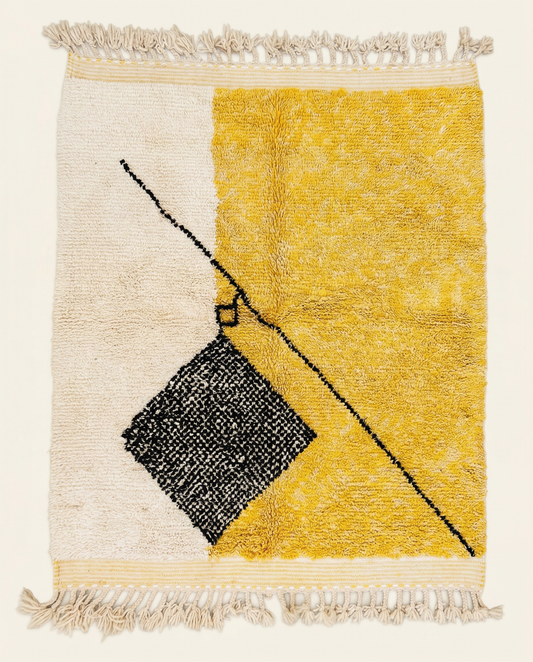 Plush cream and yellow Azilal Moroccan rug with a bold black abstract square and diagonal line, by NURA.