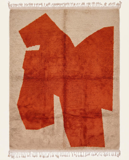 Plush cream Beni Ourain Moroccan rug featuring a massive, bold rust abstract color block and high pile, by NURA.