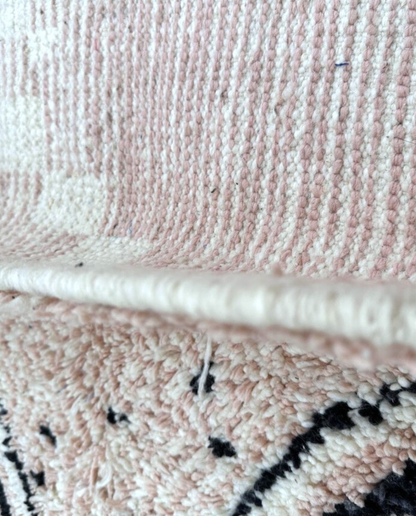 DOHA Azilal blush checker diamond lattice Moroccan rug close-up showing hand-knotted wool texture and pile detail 2, by NURA