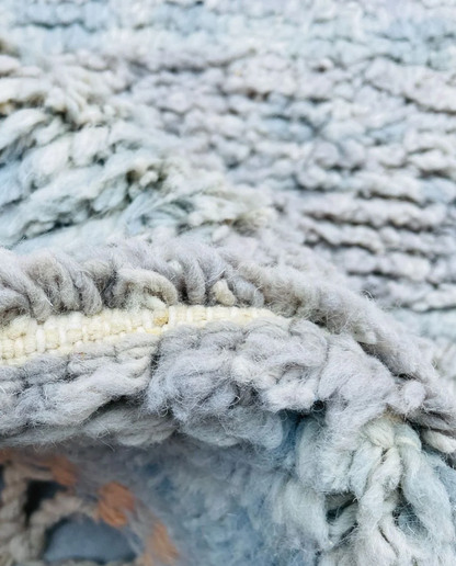 DOUNIA Azilal cream abstract color block Moroccan rug close-up showing hand-knotted wool texture and pile detail 2, by NURA