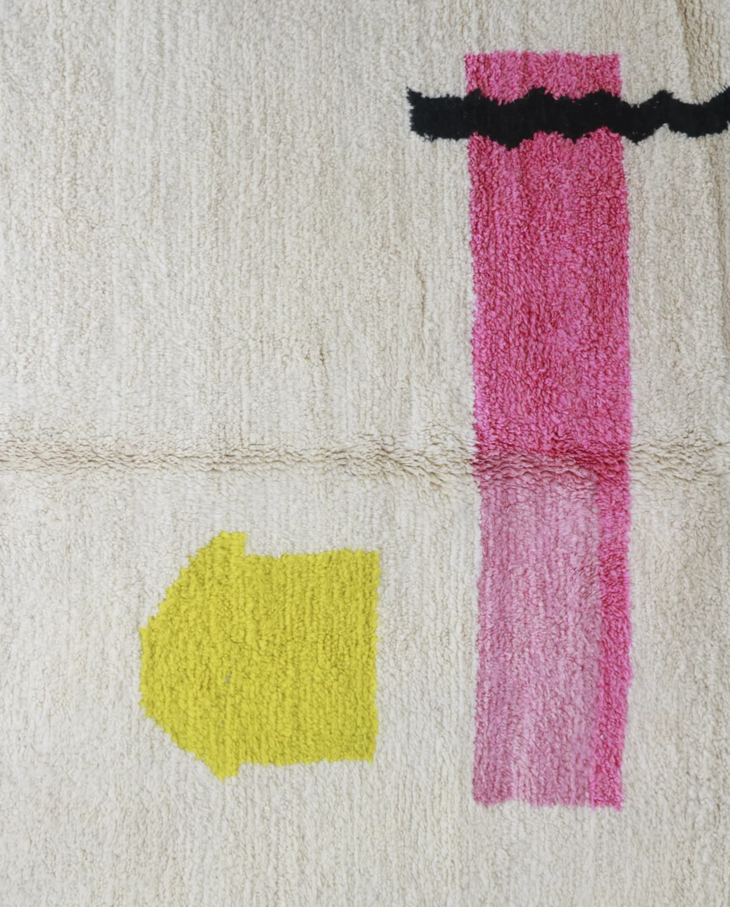 DUNA Beni Ourain cream organic abstract Moroccan rug close-up showing hand-knotted wool texture and pile detail 1, by NURA