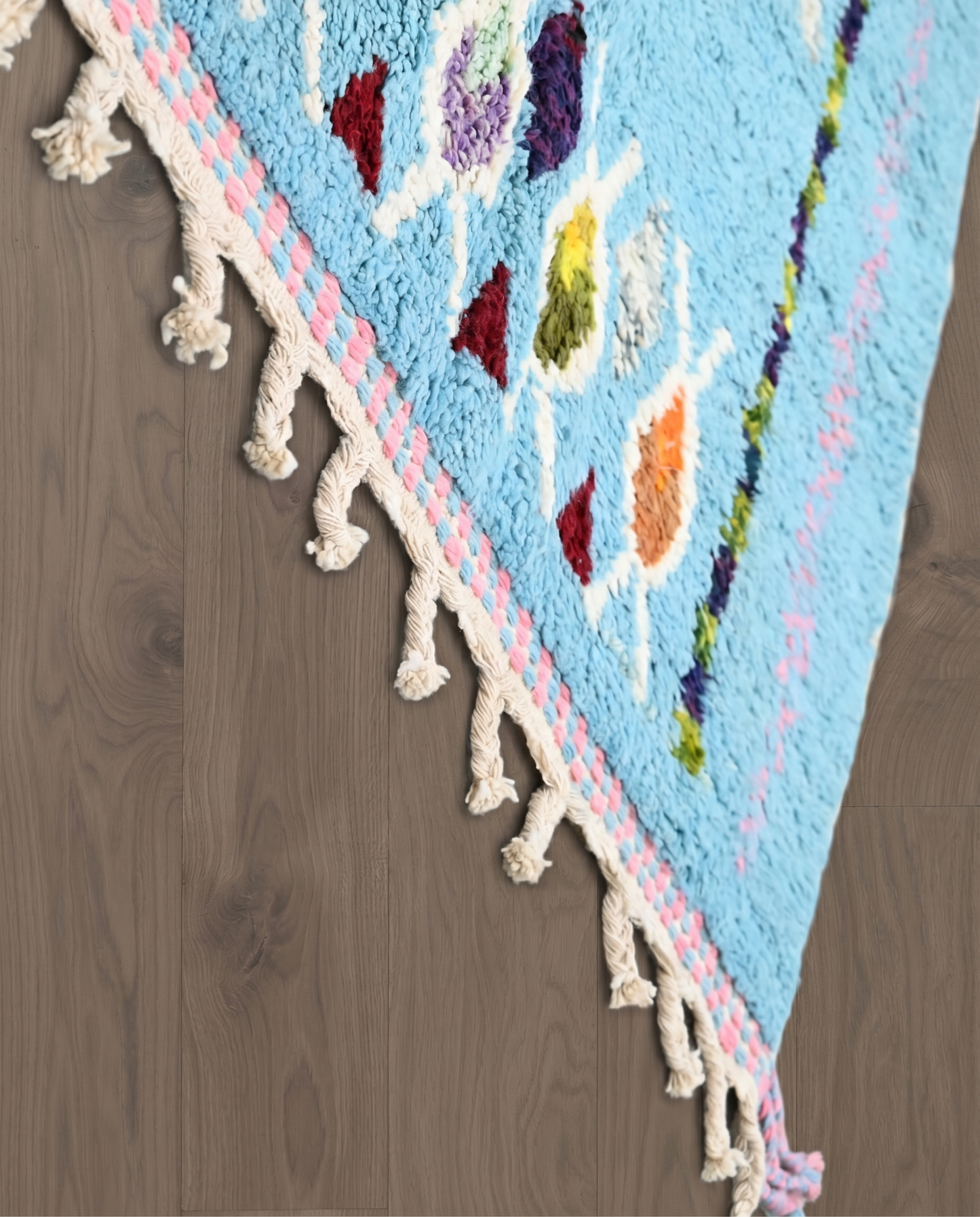 FADDA Azilal sky blue floating forms Moroccan rug close-up of hand-tied fringe and kilim band detail, by NURA
